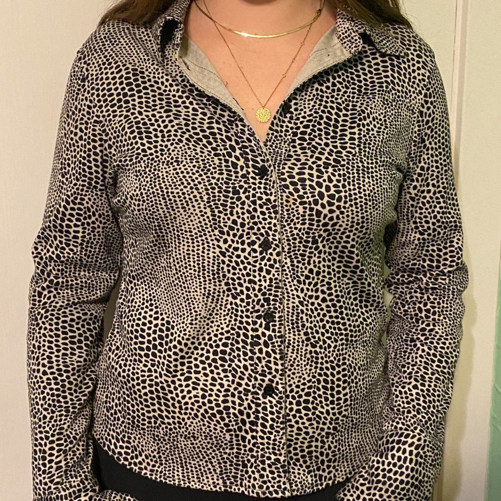 Black and white leopard print button down blouse made by NY&CO